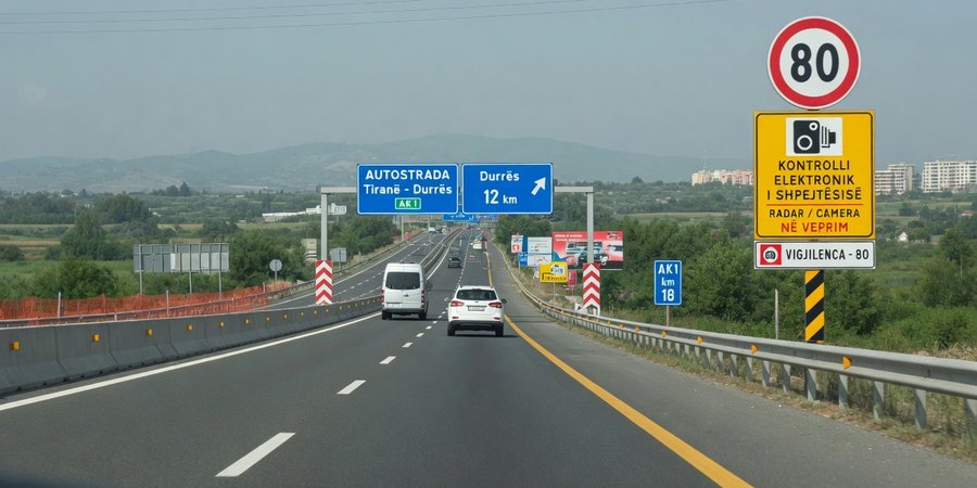 AK1 motorway between Tirana and Durrës with speed-limit and camera signs