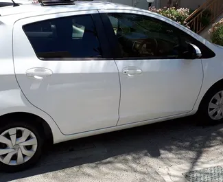 Frontvisning av en leiebil Toyota Vitz i Limassol, Kypros ✓ Bil #274. ✓ Automatisk TM ✓ 0 anmeldelser.