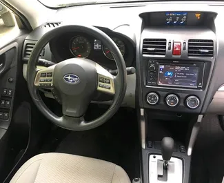 Subaru Forester 2016 disponible para alquilar en Tiflis, con límite de millaje de ilimitado.