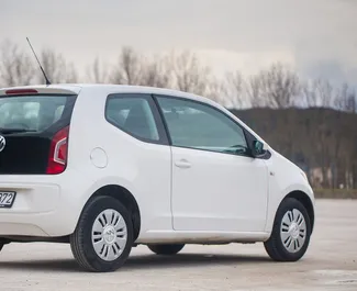 Volkswagen Up 2013 location de voiture au Monténégro, avec ✓ Essence carburant et 60 chevaux ➤ À partir de 16 EUR par jour.