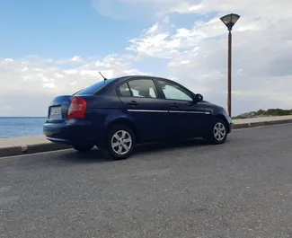 Front view of a rental Hyundai Accent in Crete, Greece ✓ Car #1087. ✓ Automatic TM ✓ 0 reviews.