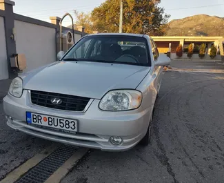 تأجير سيارة Hyundai Accent 2006 في في الجبل الأسود، تتميز بـ ✓ وقود البنزين وقوة 85 حصان ➤ بدءًا من 16 EUR يوميًا.