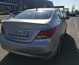 Hyundai Solaris 2015 auton vuokraus Krimillä, sisältää ✓ Bensiini polttoaineen ja 123 hevosvoimaa ➤ Alkaen 2000 RUB päivässä.