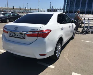 Verhuur Toyota Corolla. Economy, Comfort Auto te huur op de Krim ✓ Borg van Borg van 10000 RUB ✓ Verzekeringsmogelijkheden TPL, CDW, Diefstal, Buitenland.