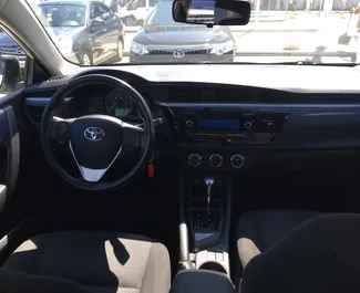 Toyota Corolla 2015, Simferopol Havalimanı'nda için kiralık, sınırsız kilometre sınırı ile.