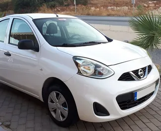 Frontvisning av en leiebil Nissan Micra på Rhodos, Hellas ✓ Bil #1497. ✓ Automatisk TM ✓ 0 anmeldelser.