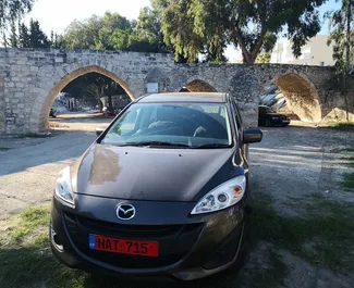 Predný pohľad na prenajaté auto Mazda Premacy v v Limassole, Cyprus ✓ Auto č. 839. ✓ Prevodovka Automatické TM ✓ Hodnotenia 0.