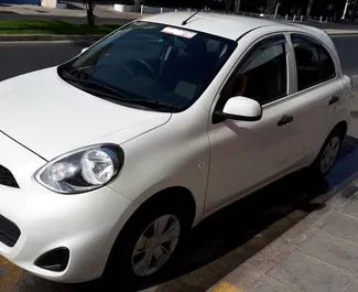 Frontvisning af en udlejnings Nissan March i Limassol, Cypern ✓ Bil #271. ✓ Automatisk TM ✓ 0 anmeldelser.