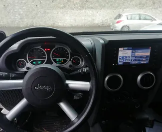 Jeep Wrangler rental. Comfort, SUV Car for Renting in Georgia ✓ Deposit of 1080 GEL ✓ TPL, CDW insurance options.