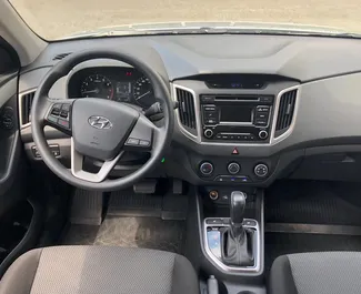 Hyundai Creta 2019 automašīnas noma Krievijā, iezīmes ✓ Benzīns degviela un 126 zirgspēki ➤ Sākot no 3400 RUB dienā.