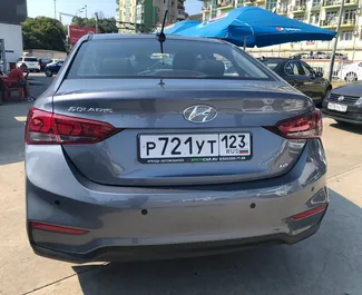 Hyundai Solaris 2018 car hire in Russia, featuring ✓ Petrol fuel and 123 horsepower ➤ Starting from 2400 RUB per day.