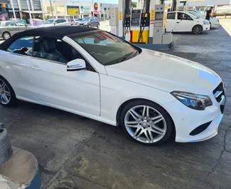 Front view of a rental Mercedes-Benz E220 Cabrio in Limassol, Cyprus ✓ Car #2019. ✓ Automatic TM ✓ 0 reviews.