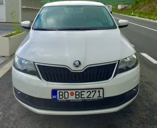 Priekinė automobilio, kurį nuomojate Skoda Rapid Budvoje, Juodkalnija vaizdas ✓ Automobilis #2025. ✓ Pavarų dėžė Automatinis TM ✓ Atsiliepimai 1.