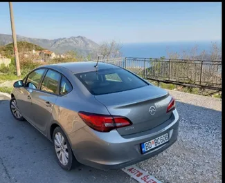Car Hire Opel Astra Sedan #2026 Automatic in Budva, equipped with 1.6L engine ➤ From Vuk in Montenegro.