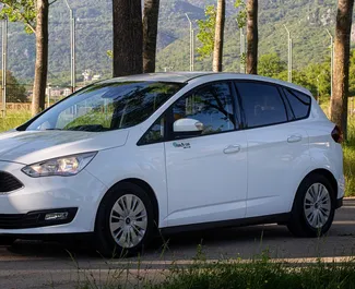 Frontvisning av en leiebil Ford C-Max i Budva, Montenegro ✓ Bil #2187. ✓ Manuell TM ✓ 1 anmeldelser.