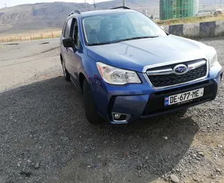 Vooraanzicht van een huurauto Subaru Forester in Tbilisi, Georgië ✓ Auto #2261. ✓ Transmissie Automatisch TM ✓ 0 beoordelingen.