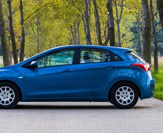 Hyundai i30 2015 car hire in Montenegro, featuring ✓ Petrol fuel and 127 horsepower ➤ Starting from 64 EUR per day.