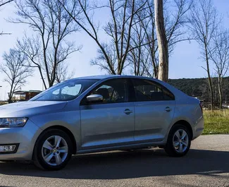 Front view of a rental Skoda Rapid in Becici, Montenegro ✓ Car #2470. ✓ Manual TM ✓ 0 reviews.