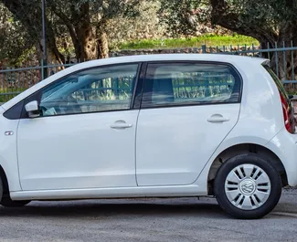Volkswagen Up 2015 automobilio nuoma Juodkalnijoje, savybės ✓ Benzinas degalai ir 73 arklio galios ➤ Nuo 28 EUR per dieną.