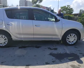 Aluguel de carro Renault Sandero 2015 na Crimeia, com ✓ combustível Gasolina e 82 cavalos de potência ➤ A partir de 1121 RUB por dia.