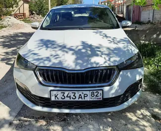 Nomas automašīnas priekšskats Skoda Rapid Simferopolē, Krima ✓ Automašīna #3079. ✓ Pārnesumu kārba Automātiskais TM ✓ Atsauksmes 0.