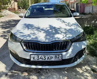 Front view of a rental Skoda Rapid in Simferopol, Crimea ✓ Car #3079. ✓ Automatic TM ✓ 0 reviews.