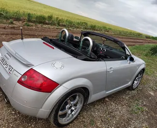 Audi TT Cabrio 2015 car hire in Crimea, featuring ✓ Petrol fuel and 224 horsepower ➤ Starting from 3186 RUB per day.