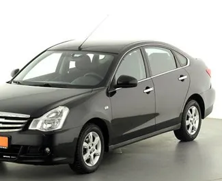 Frontvisning af en udlejnings Nissan Almera i Kertj, Krim ✓ Bil #2745. ✓ Automatisk TM ✓ 0 anmeldelser.
