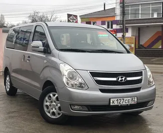 Front view of a rental Hyundai Grand Starex in Simferopol, Crimea ✓ Car #2692. ✓ Automatic TM ✓ 0 reviews.