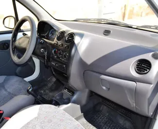 Daewoo Matiz 2012 autóbérlés a Krímben, jellemzők ✓ Benzin üzemanyag és 80 lóerő ➤ Napi 944 RUB-tól kezdődően.