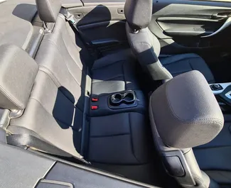 BMW 218i Cabrio kiralama. Konfor, Premium, Cabrio Türünde Araç Kiralama Kıbrıs'ta ✓ Depozito 1000 EUR ✓ TPL, CDW, SCDW, FDW, Hırsızlık, Genç sigorta seçenekleri.