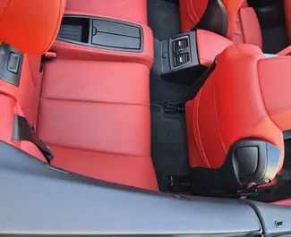BMW 430i Cabrio 2018 disponibile per il noleggio a Limassol, con limite di chilometraggio di illimitato.