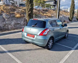 Ενοικίαση αυτοκινήτου Suzuki Swift 2014 στην Κύπρο, περιλαμβάνει ✓ καύσιμο Βενζίνη και  ίππους ➤ Από 22 EUR ανά ημέρα.