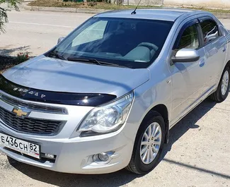 Μπροστινή όψη ενοικιαζόμενου Chevrolet Cobalt στη Φεοδοσία, Κριμαία ✓ Αριθμός αυτοκινήτου #3446. ✓ Κιβώτιο ταχυτήτων Αυτόματο TM ✓ 0 κριτικές.