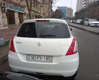 تأجير سيارة Suzuki Swift 2014 في في أذربيجان، تتميز بـ ✓ وقود البنزين وقوة  حصان ➤ بدءًا من 43 AZN يوميًا.