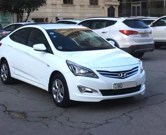 Frontvisning af en udlejnings Hyundai Accent i Baku, Aserbajdsjan ✓ Bil #3495. ✓ Automatisk TM ✓ 0 anmeldelser.