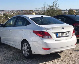 Front view of a rental Hyundai Accent Blue at Antalya Airport, Turkey ✓ Car #3287. ✓ Automatic TM ✓ 0 reviews.