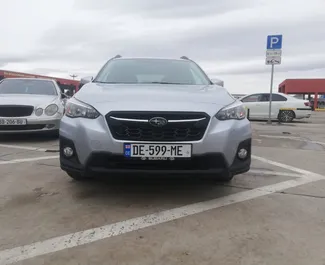 Frontvisning av en leiebil Subaru Crosstrek i Tbilisi, Georgia ✓ Bil #3852. ✓ Automatisk TM ✓ 1 anmeldelser.