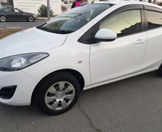 Mazda Demio 2014 beschikbaar voor verhuur in Larnaca, met een kilometerlimiet van onbeperkt.