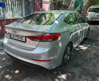 Najem avtomobila Hyundai Elantra 2017 v v Gruziji, z značilnostmi ✓ gorivo Bencin in 147 konjskih moči ➤ Od 105 GEL na dan.