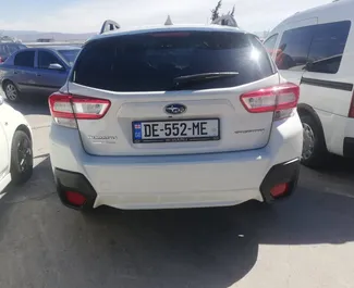 Subaru Crosstrek 2018 διαθέσιμο για ενοικίαση στην Τιφλίδα, με όριο χιλιομέτρων απεριόριστο.