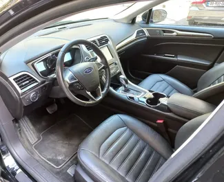 Interior of Ford Fusion Sedan for hire in Georgia. A Great 5-seater car with a Automatic transmission.