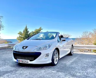 Frontvisning av en leiebil Peugeot 308cc i Budva, Montenegro ✓ Bil #4394. ✓ Automatisk TM ✓ 2 anmeldelser.