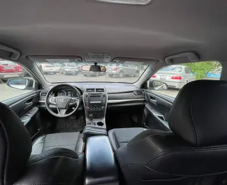 Toyota Camry rental. Comfort, Premium Car for Renting in Georgia ✓ Without Deposit ✓ TPL, FDW, Passengers, Theft, Abroad, No Deposit insurance options.