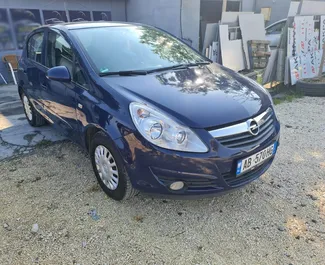 Frontvisning av en leiebil Opel Corsa i Tirana, Albania ✓ Bil #4514. ✓ Automatisk TM ✓ 0 anmeldelser.