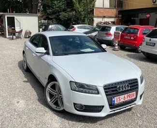 Vooraanzicht van een huurauto Audi A5 in Tirana, Albanië ✓ Auto #4588. ✓ Transmissie Handmatig TM ✓ 0 beoordelingen.