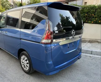 Wynajmij Nissan Serena 2019 na Cyprze. Paliwo: Benzyna. Moc: 120 KM ➤ Koszt od 40 EUR za dobę.