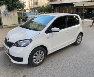 Μπροστινή όψη ενοικιαζόμενου Skoda Citigo στα Τίρανα, Αλβανία ✓ Αριθμός αυτοκινήτου #4574. ✓ Κιβώτιο ταχυτήτων Αυτόματο TM ✓ 0 κριτικές.