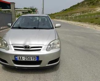 Sprednji pogled najetega avtomobila Toyota Corolla v v Tirani, Albanija ✓ Avtomobil #4622. ✓ Menjalnik Samodejno TM ✓ Mnenja 1.
