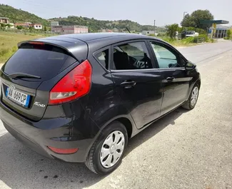 Ενοικίαση αυτοκινήτου Ford Fiesta 2011 στην Αλβανία, περιλαμβάνει ✓ καύσιμο Ντίζελ και 94 ίππους ➤ Από 20 EUR ανά ημέρα.